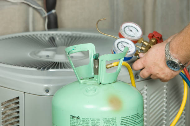 Maricopa AC & Furnace Repair technician servicing an HVAC system in Maricopa, AZ